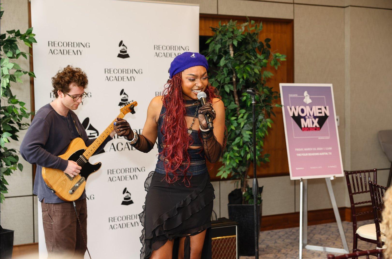 Jordan Curls performs at Women in the Mix brunch